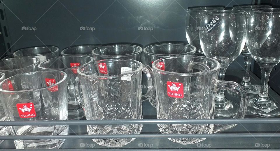 Different glasses in a rack