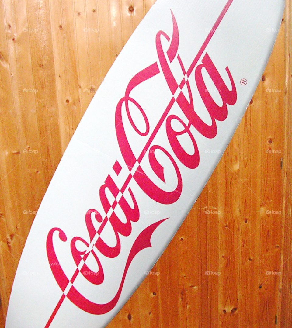 Coca-Cola surfboard sign