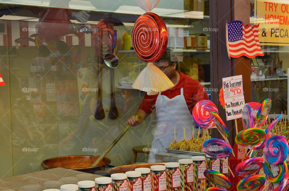 Candy maker. Man making candy