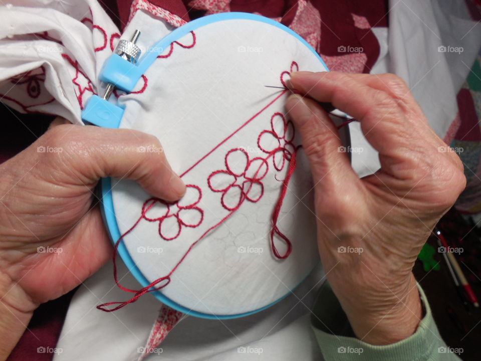 Embroidering red work