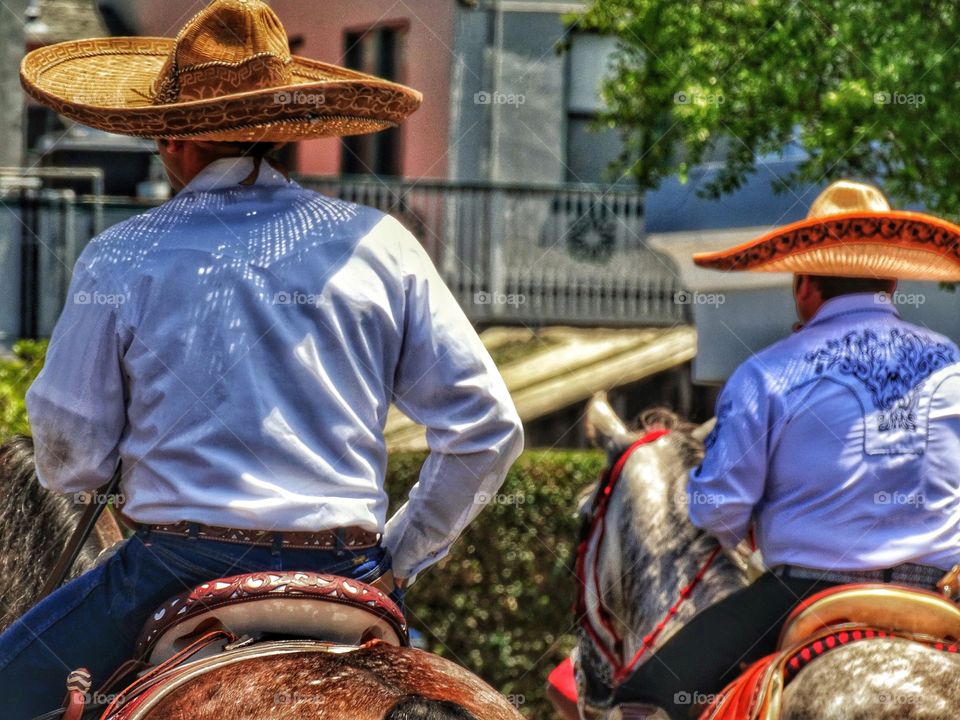 Cowboys Wearing Mexican Sombreros
