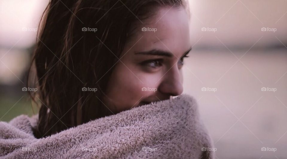 Close-up of a woman with blanket