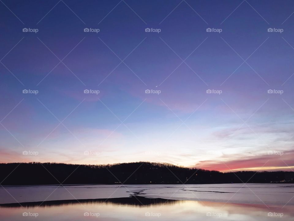 Icy lake at sunset