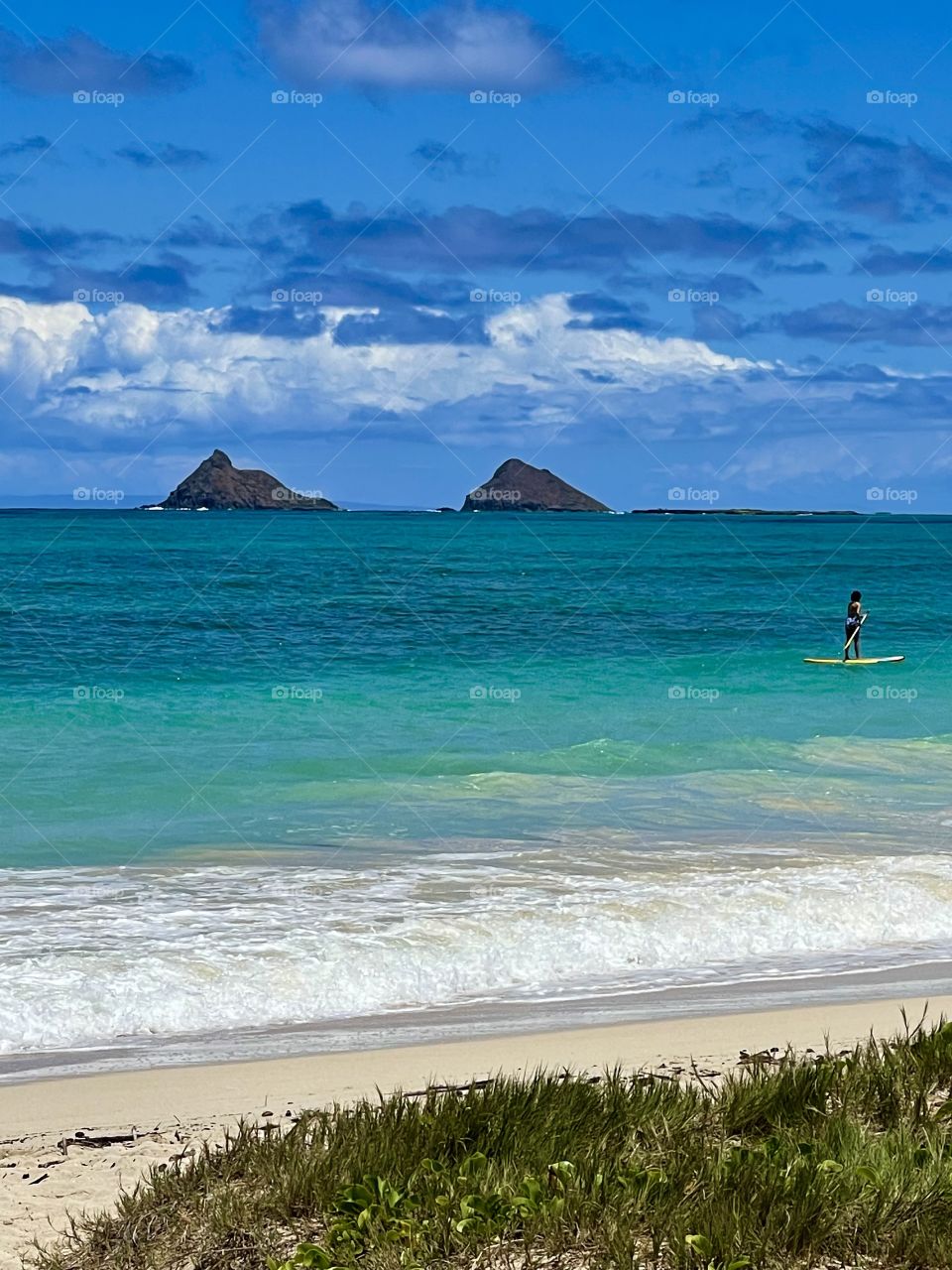 Paddle boarding near the Mokes