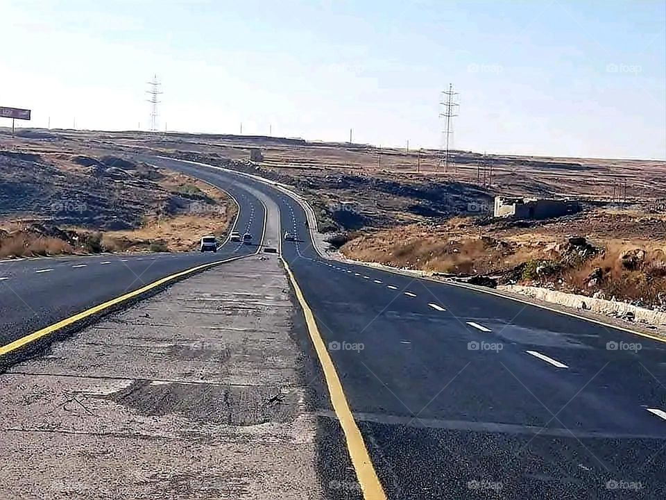 A stunning view of green mountains covered in fog in Yemen