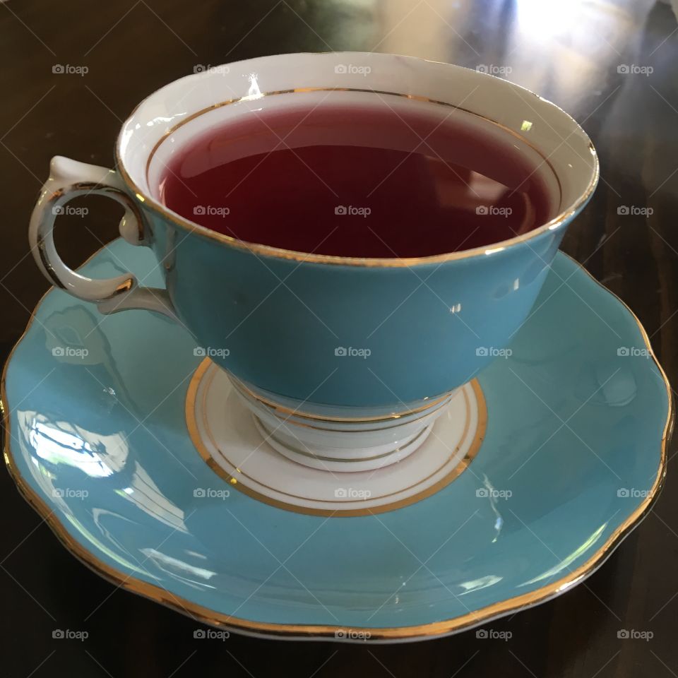Berry tea in a blue cup