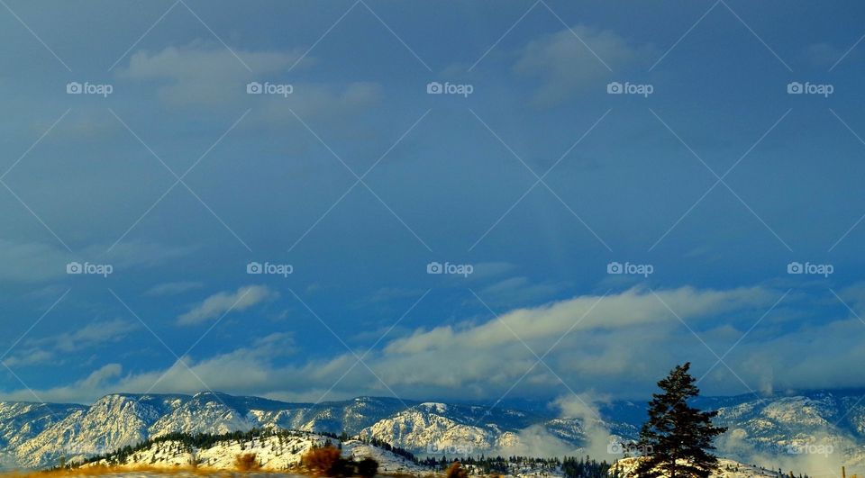 Snowy mountain tops on a sunny day