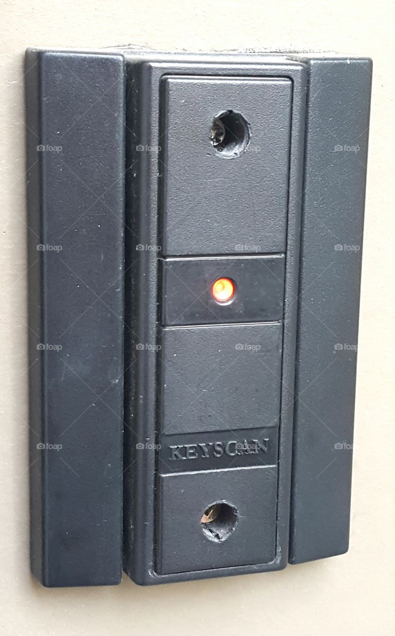 Secure fob access control unit for the door to an apartment complex.