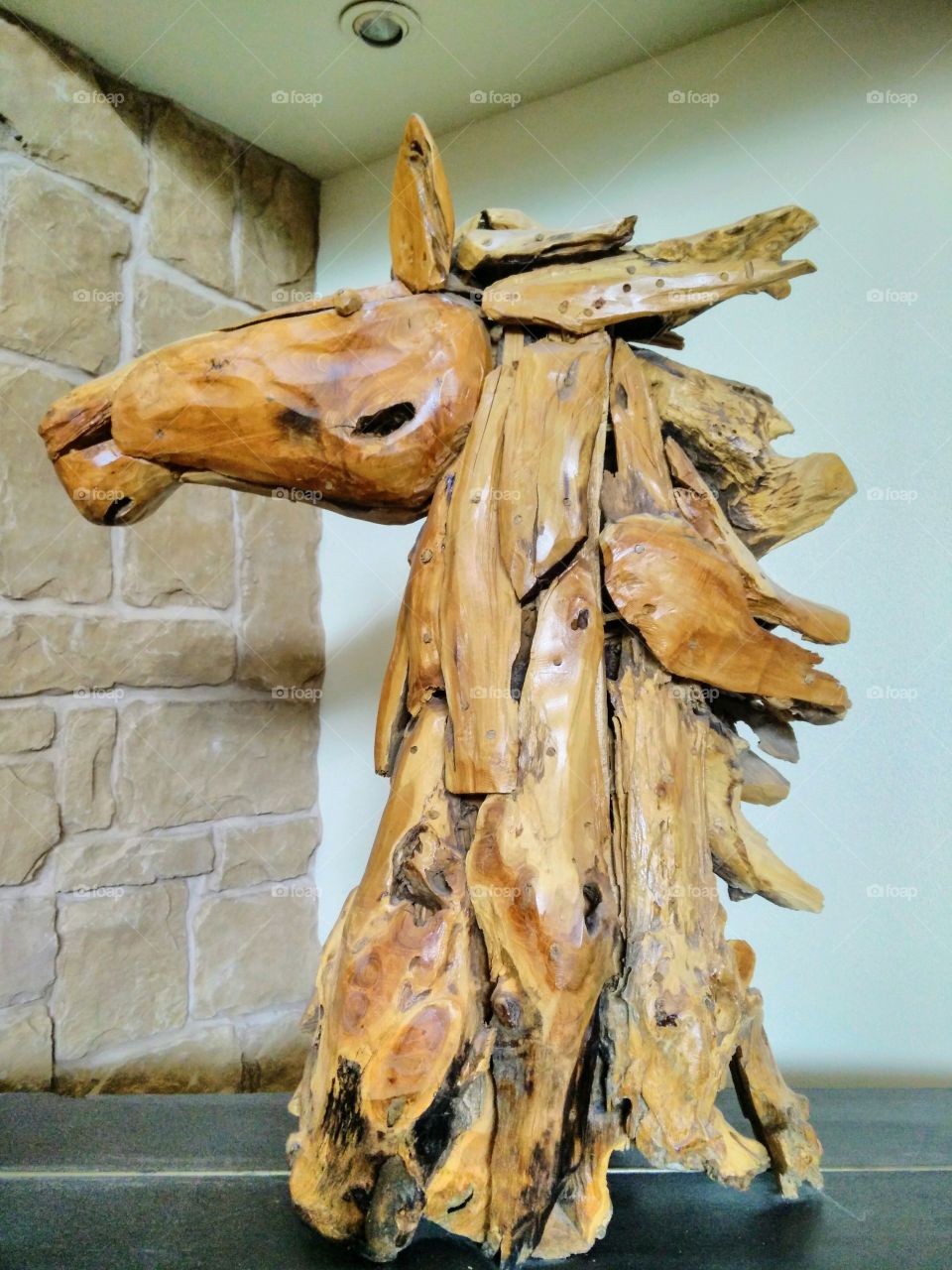 wooden horse head sculpture