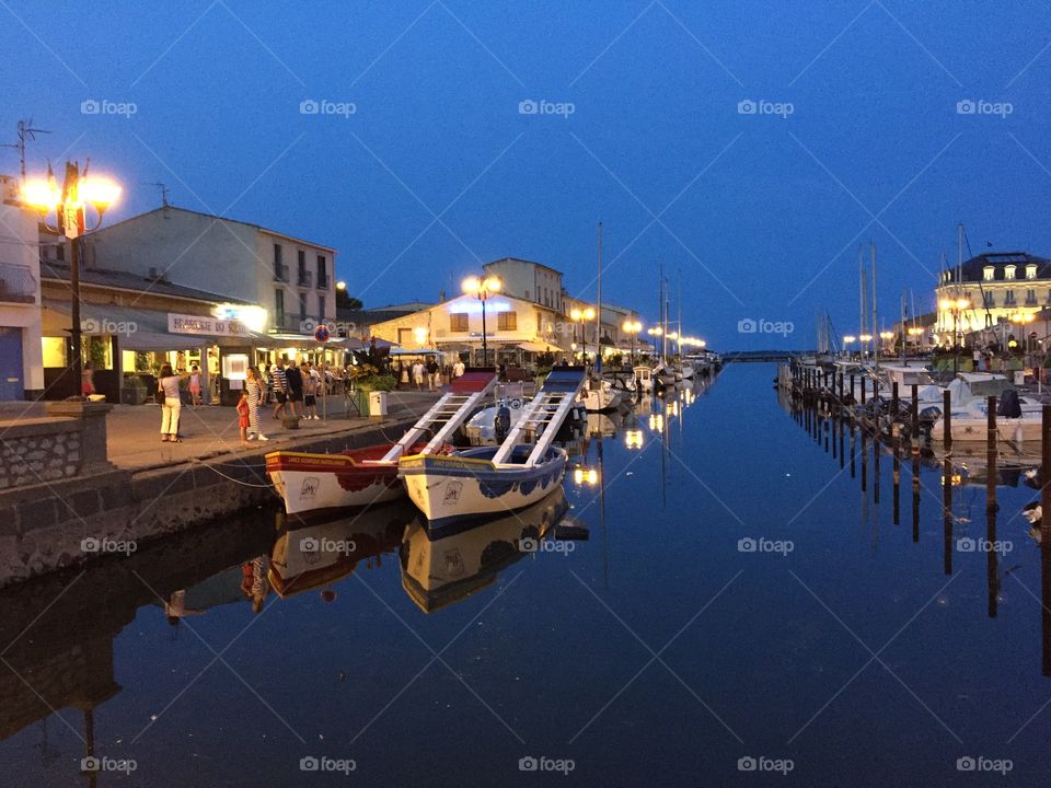 Marseillan harbour at night. Eating out at the harbour of Marseillan, France