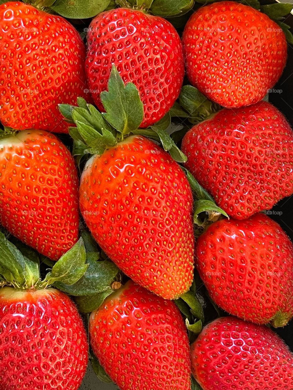 Freshly harvested red strawberries from above, red fruit, fruit from above 