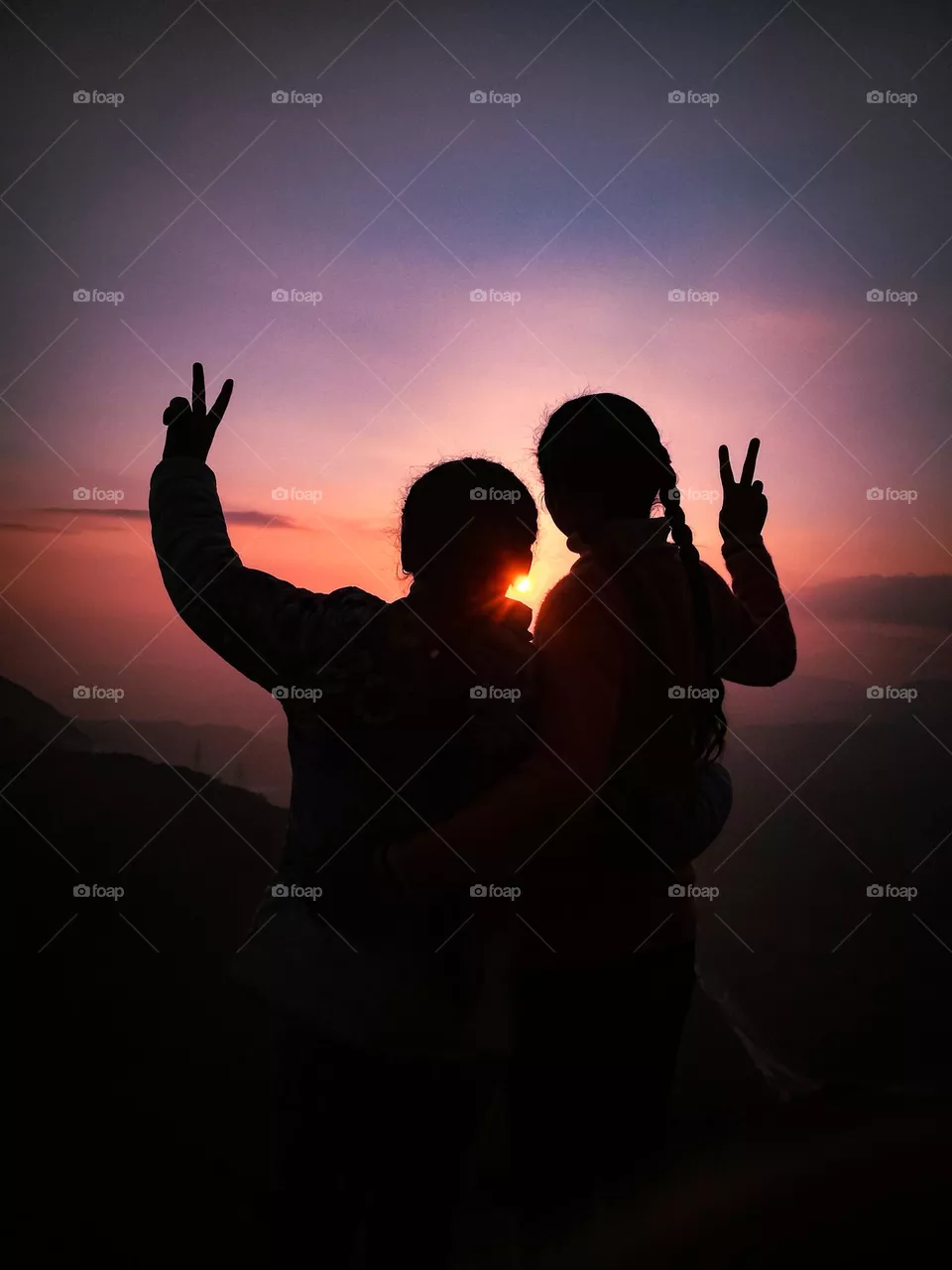 two little spirits during sunset