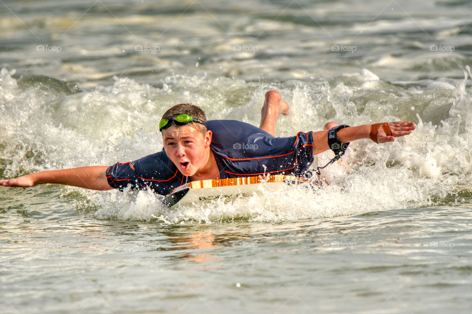 I can fly. Boogie boarding at the beach