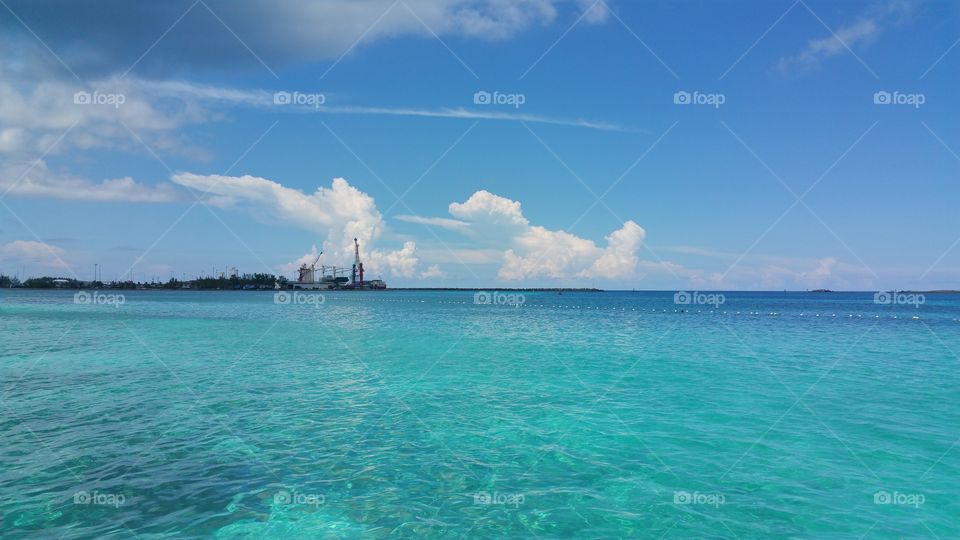 Just a beautiful view the water the clouds over this island.. breathtaking.. Nassau Bahamas