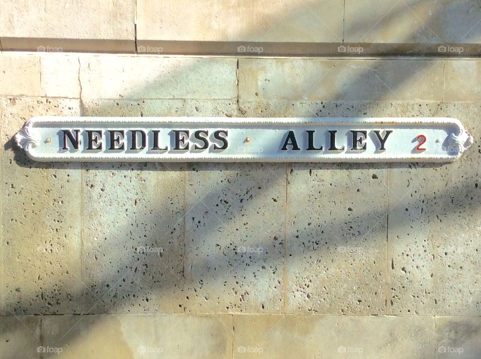 Street sign in Birmingham, the surprising think is this is Needless Alley 2...so there is at least two needless alleys in Birmingham 