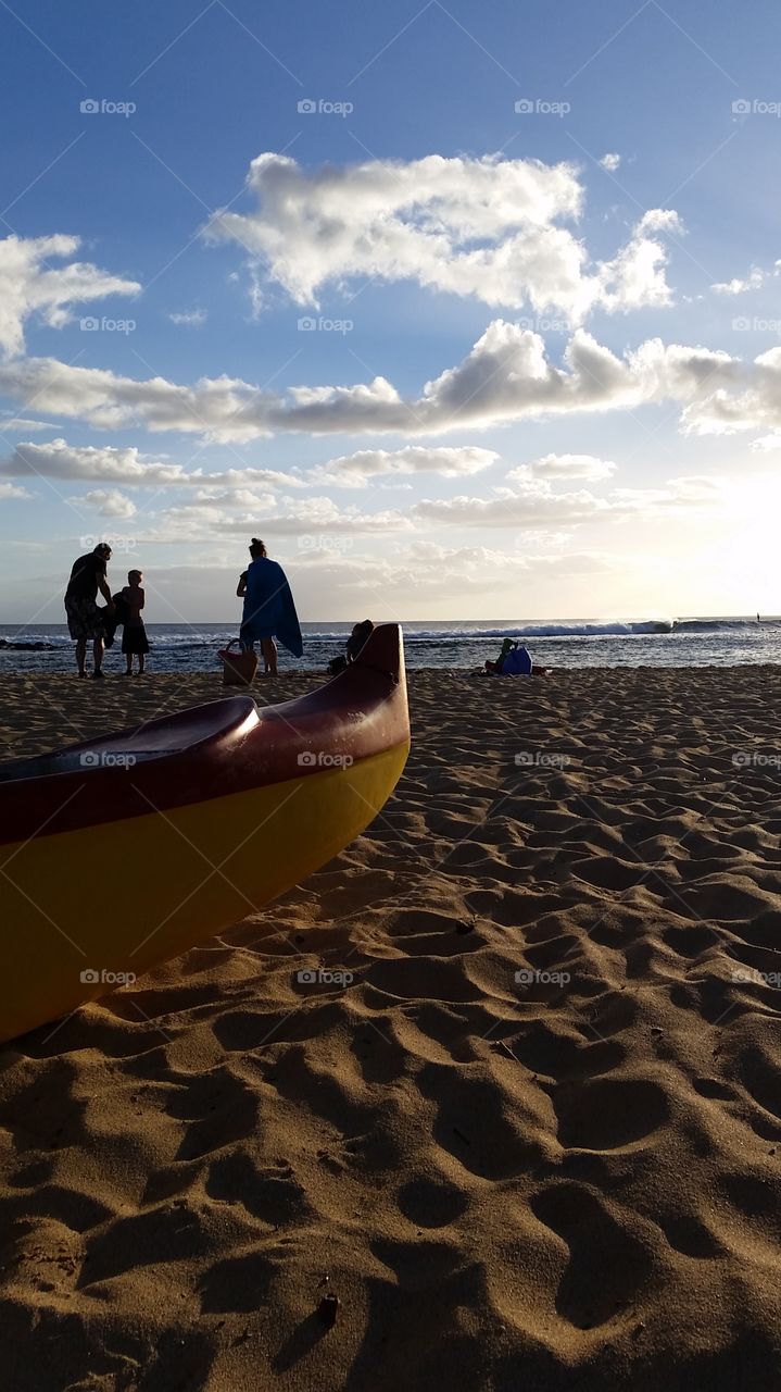 Hawaiian canoe at sunset in Poipu, Kauai.