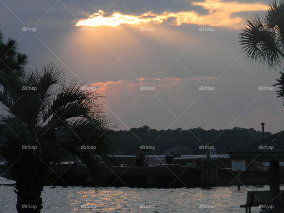 View of port on lake during sunset