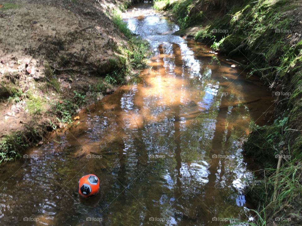 Lost ball ... trouble with hiking with wild toddlers.... everything ends up in the water. Still worth every moment 