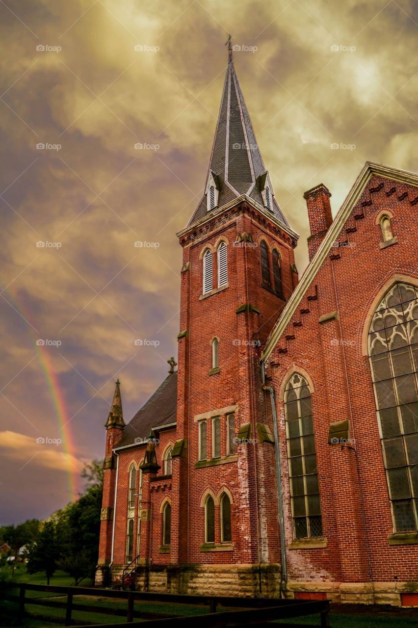 St Paul's ME church with rainbow