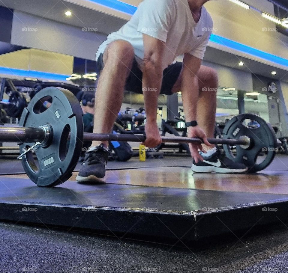 deadlifts sumo position , powerlift. targeting quads , back ,core , glutes and hamstrings.