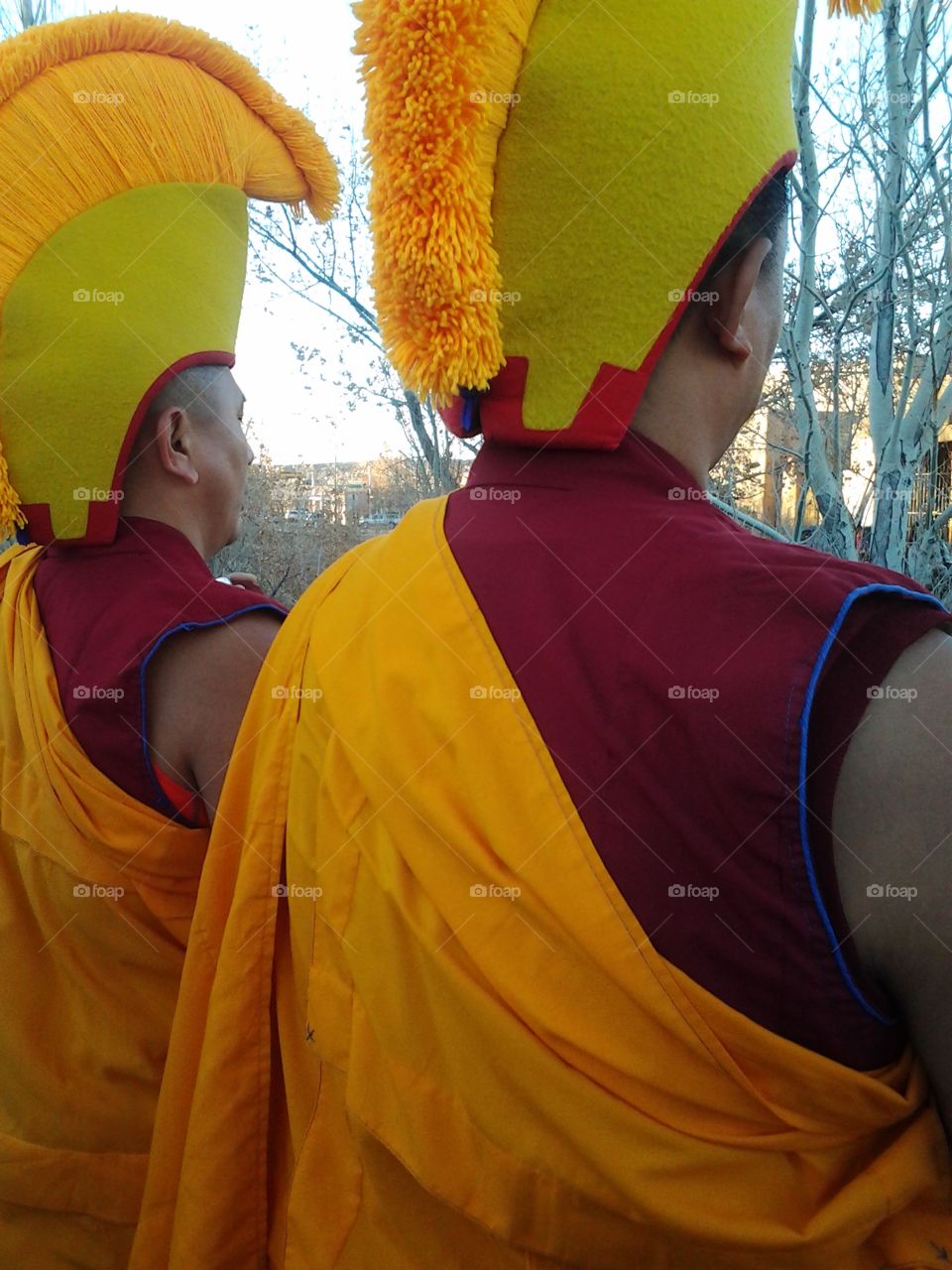 Two Tibetan Buddhist Monks from Drepung Loseling Monastery, South India.  Lamas Blessing Santa Fe River, New Mexico, USA