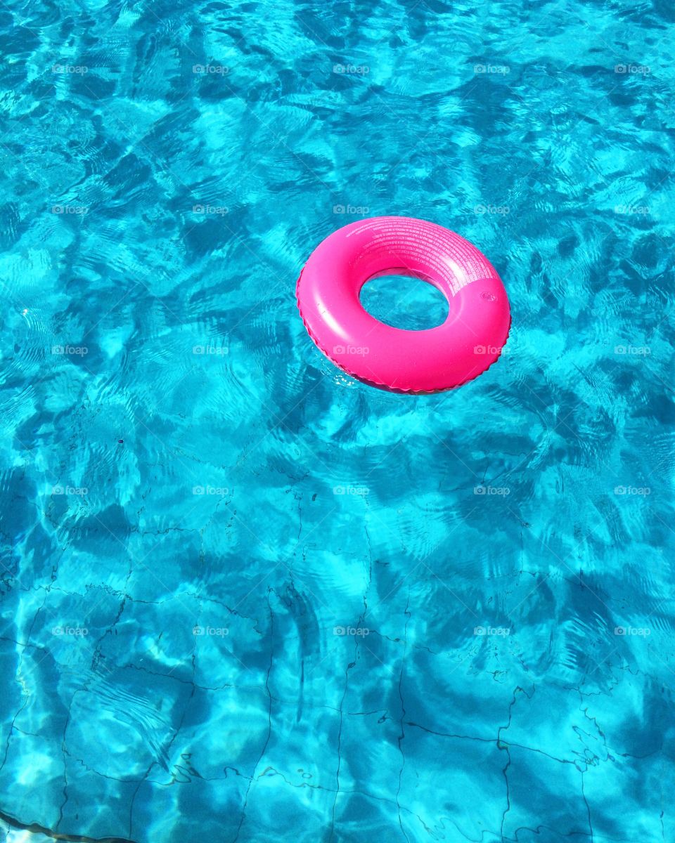 Rubber ring floating on water