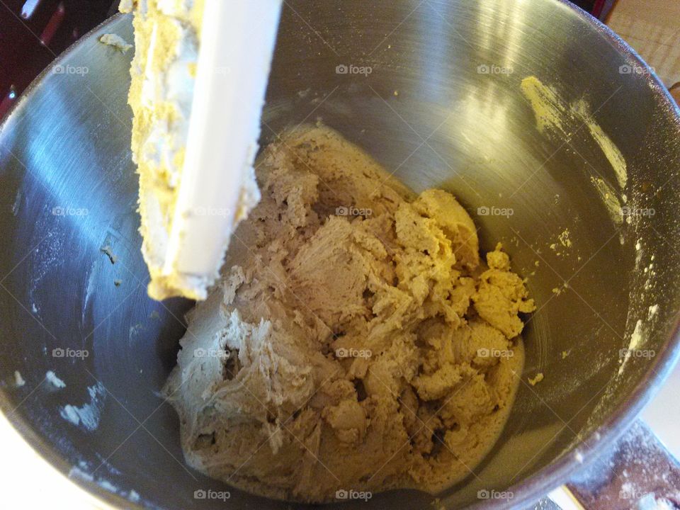 Mixing Dough. Dough in a stand mixer, with paddle attachment. 