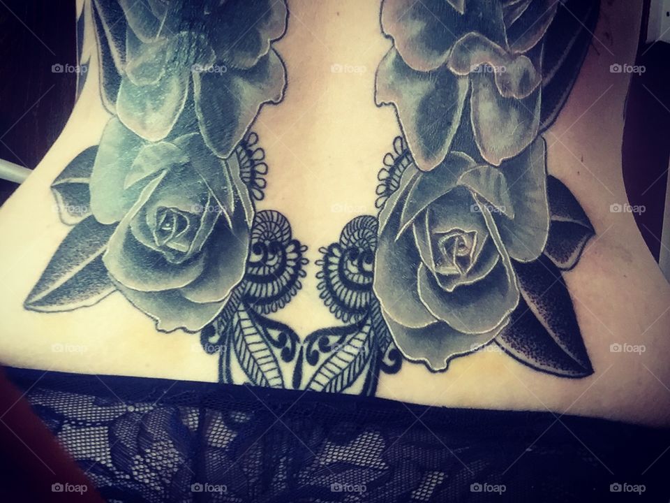 Lower back lace and rose black and grey effect tattoo
