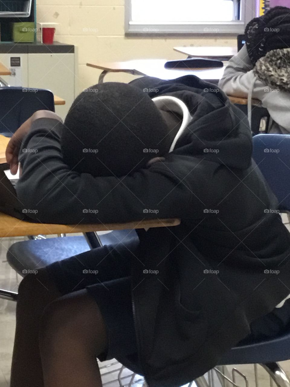 Student sleeps in class
