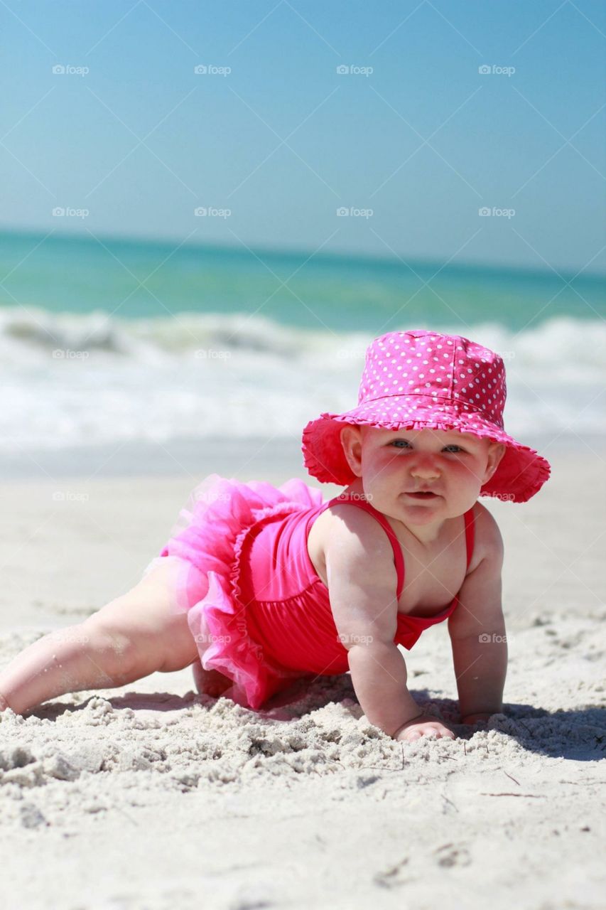 Baby girl on the beach 