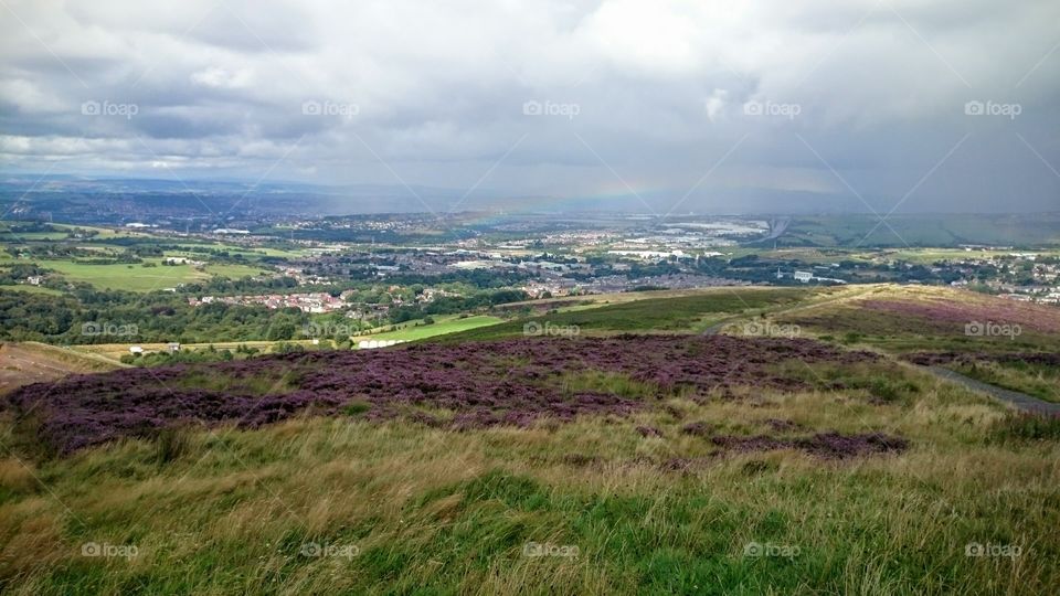 rainbow. rain and rainbow panorama over the moors