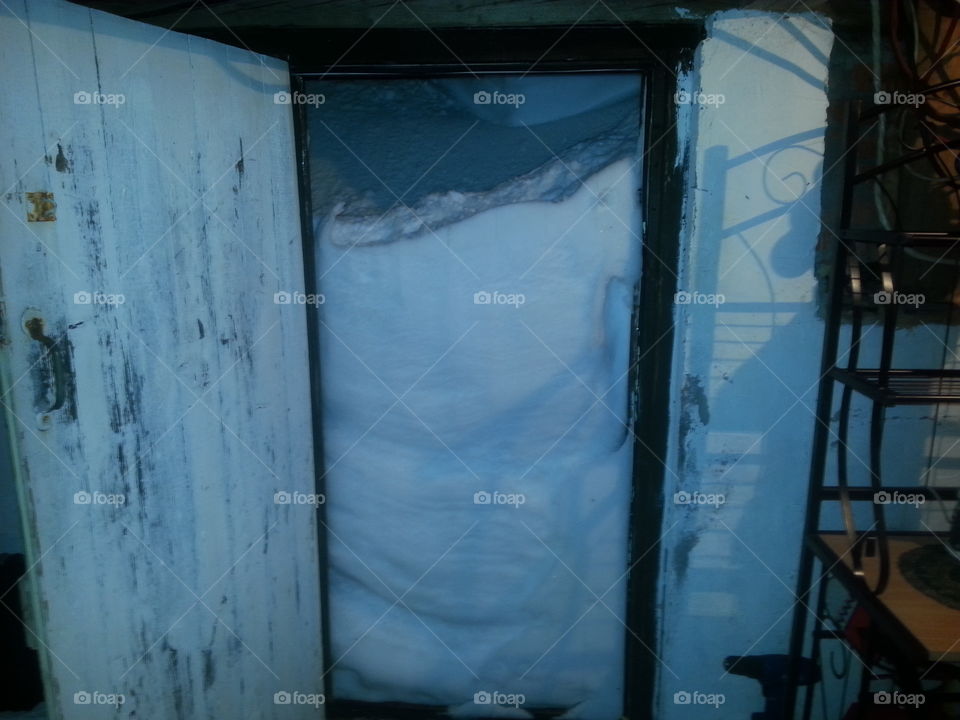 snow blocked basement door
