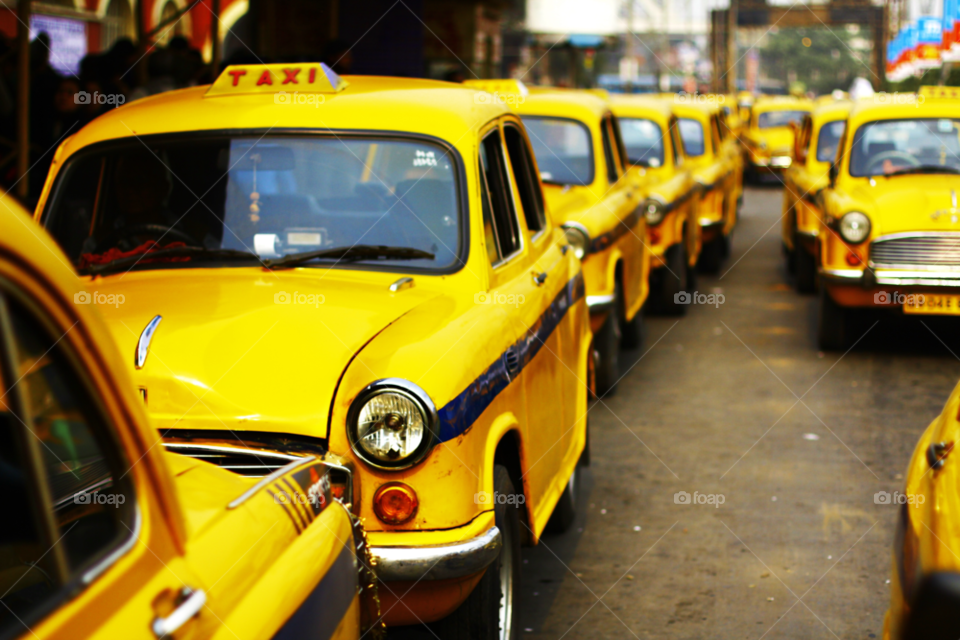 delhi india yellow car travel by fostertown