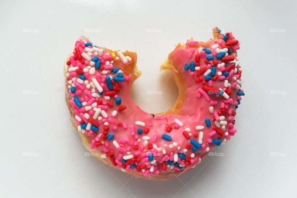 Pink donut with sprinkles 