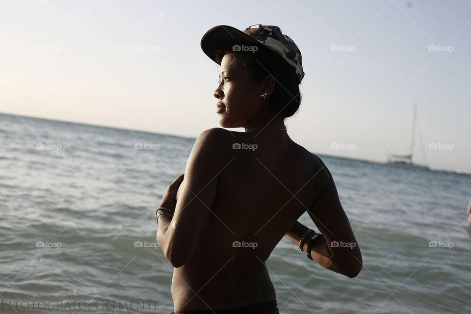 girl on the beach. topless girl on the beach