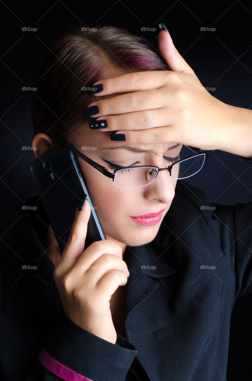 Stressed Woman Talking on Phone