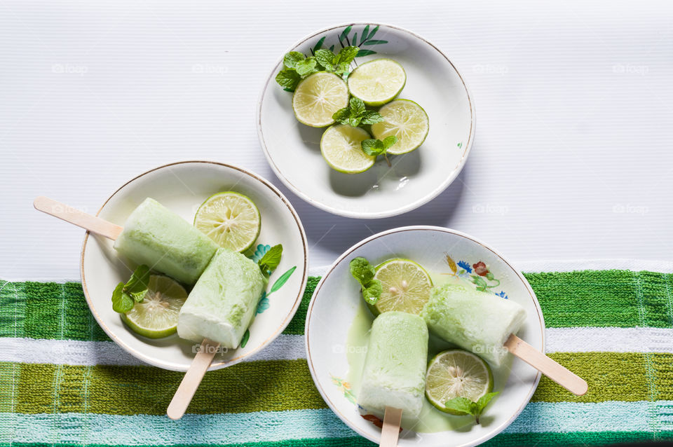 Cool lemon mint popsicles for hot summer.Summer food.