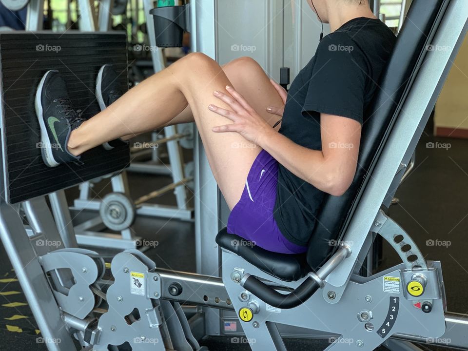 Young woman exercising in the gym