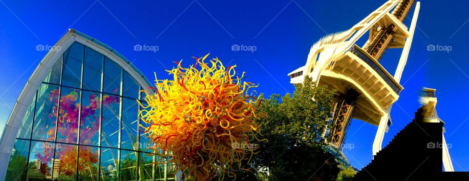 Chihuly Garden & Glass. Playing with the panoramic feature on my phone and got this strange effect. 