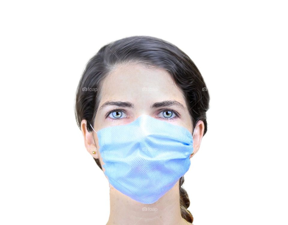 Young woman wearing a surgical mask