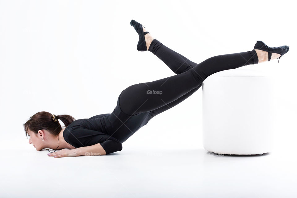 girl is engaged in dancing and stretching