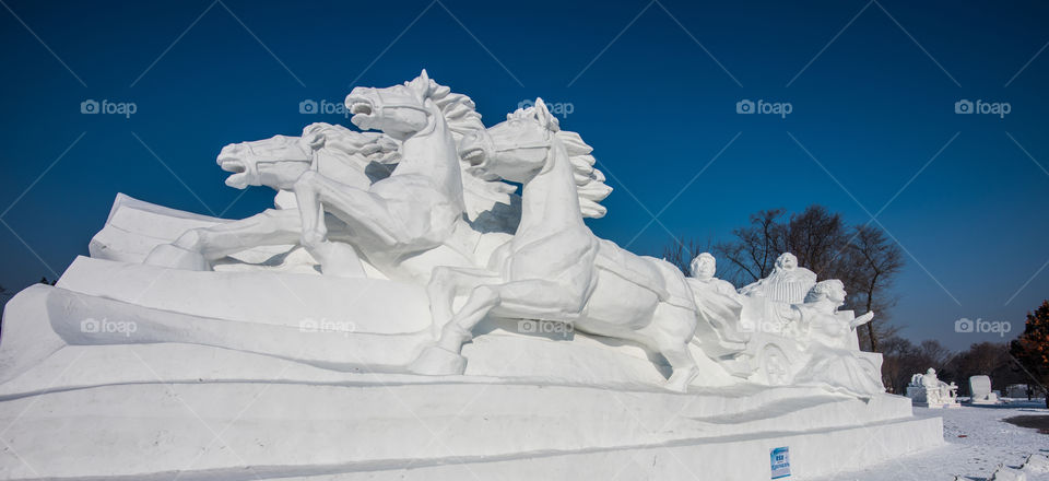 Asia china  Harbin ice Festival snow Festival ice sculptures snow building  snow ice snow horses