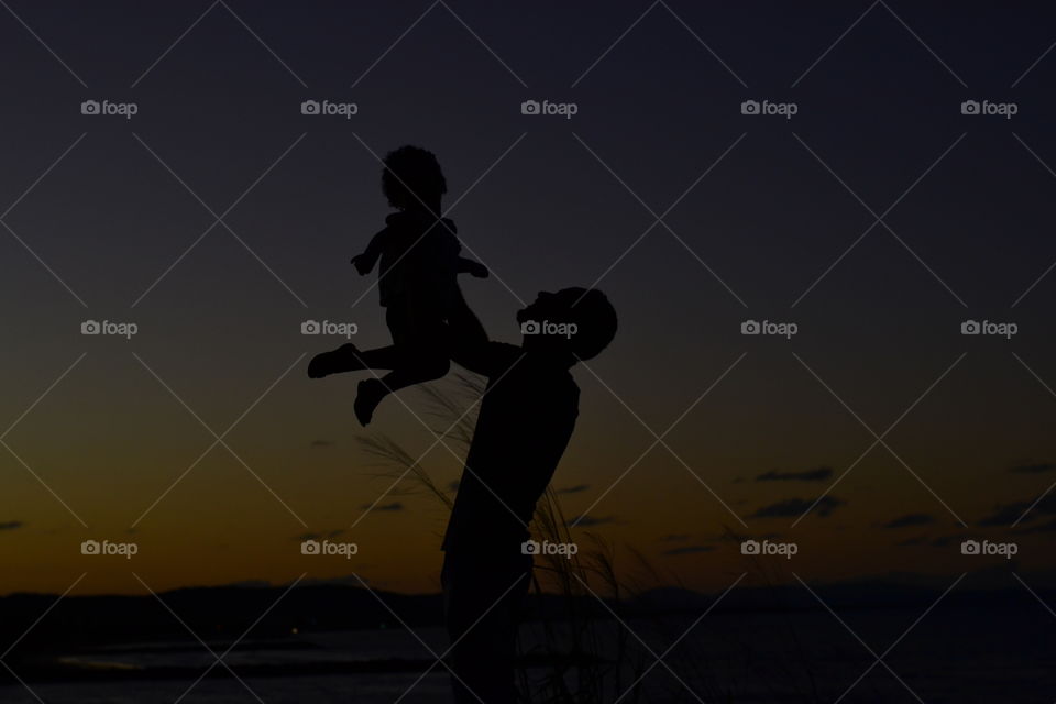 the magic of the sunset enchants smiles everywhere.