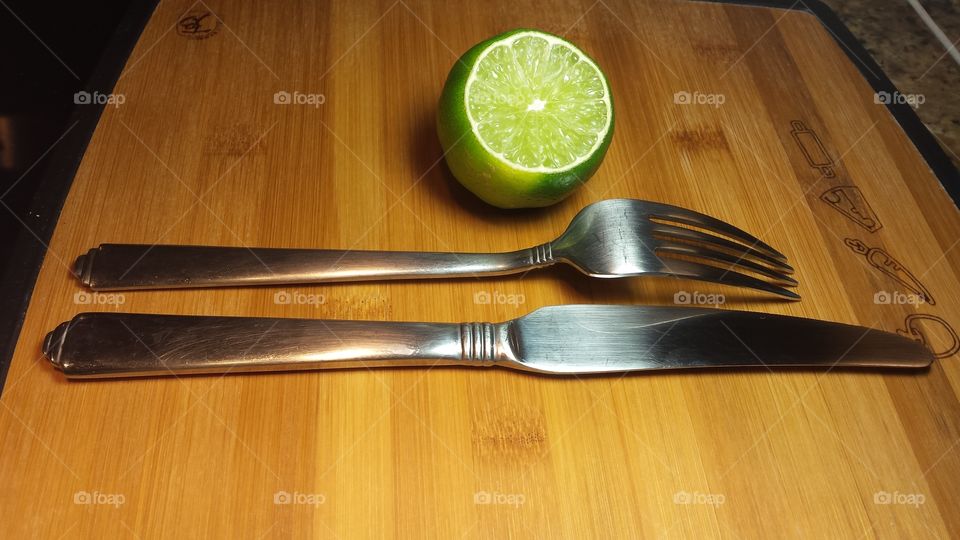 half lime and silverware