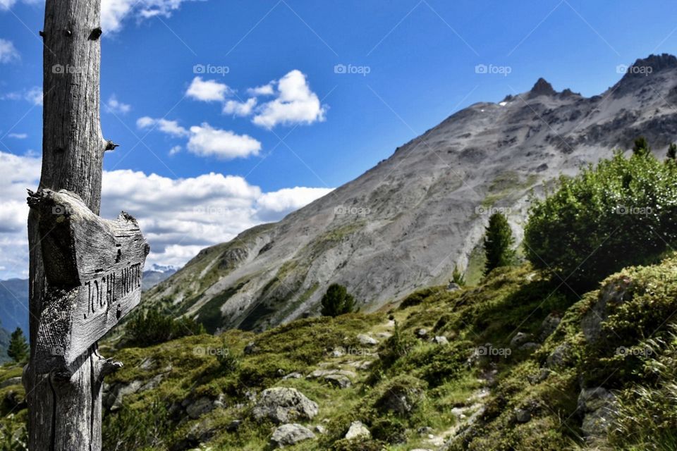 signpost in moutain landscape.