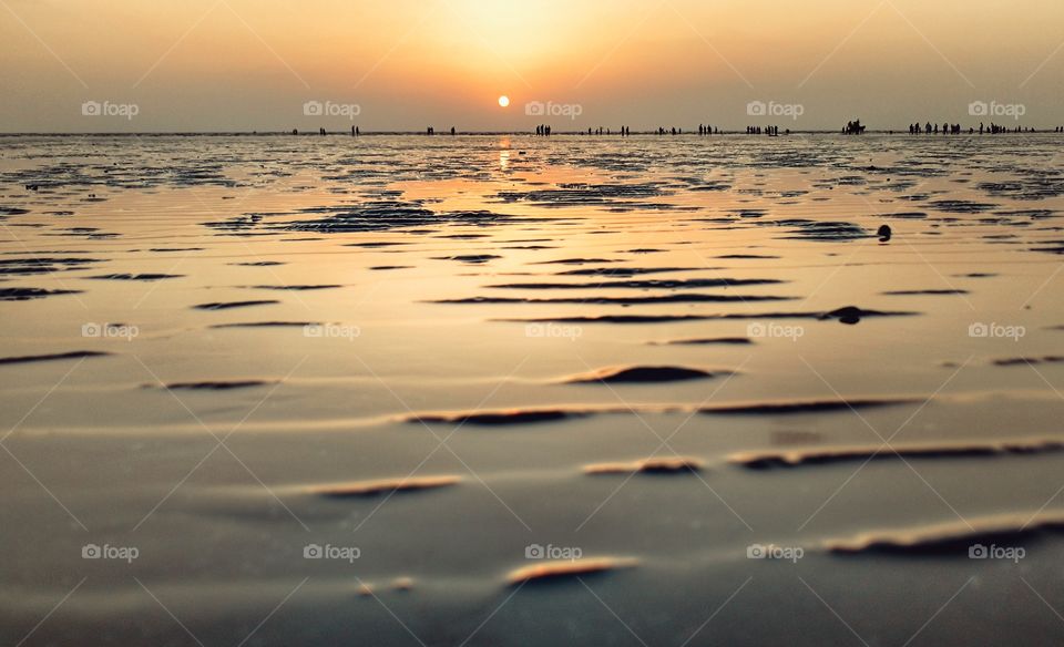 Sun and Beach , sun rays reflection in sea water, sea land