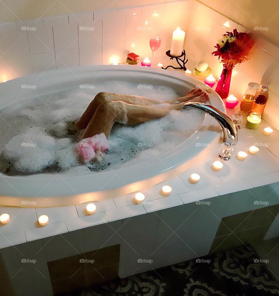 Luxurious Bubblebath surroundings  by multiple candles