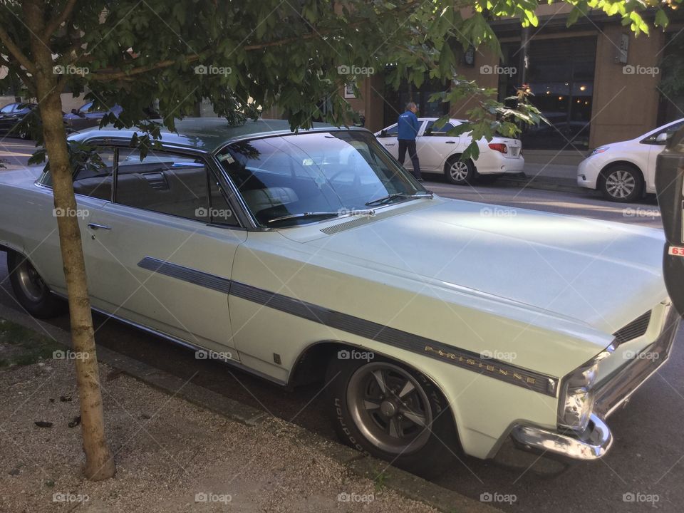 Classic Parisienne Car on the road 
