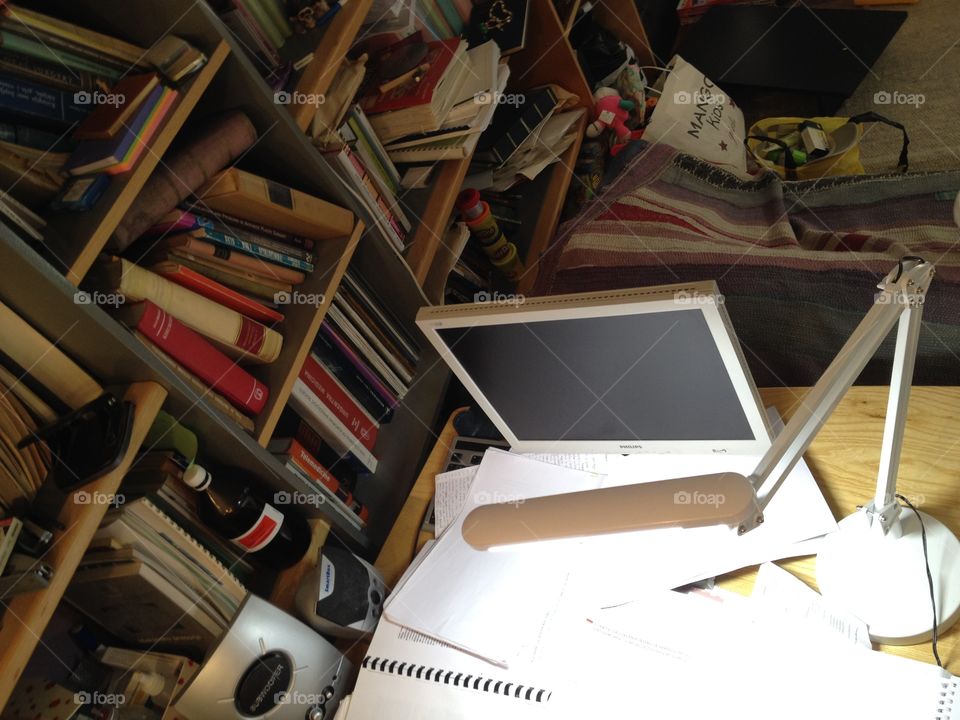 Desk from above. Mess on the table