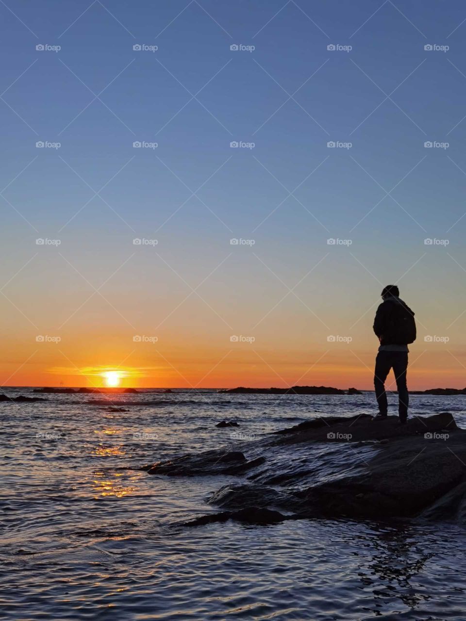 boy at the sunset